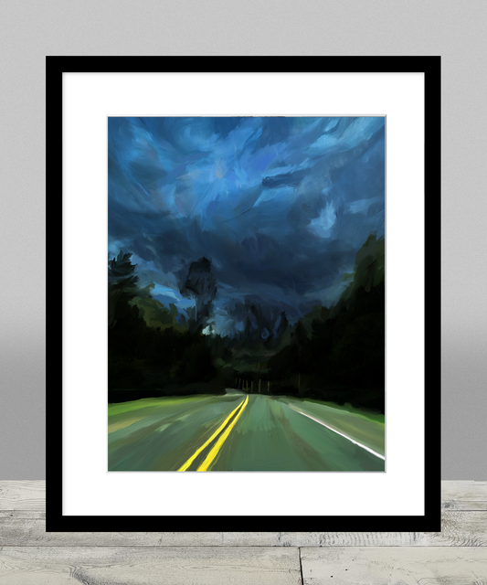 Sharp double yellow lines guide the viewer down a country road as a storm approaches.